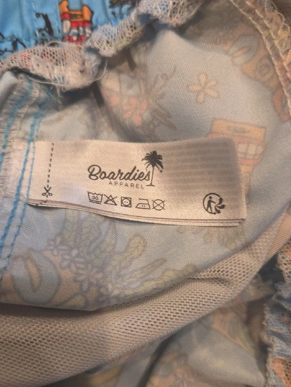 Kids' Light Blue Tiki Print Swim Trunks